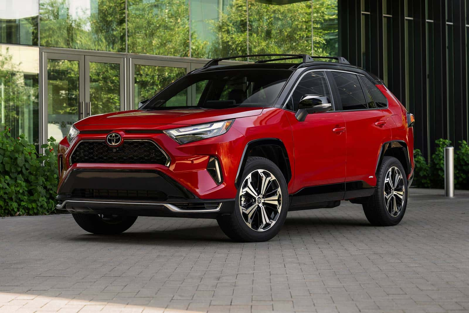 Red Toyota SUV parked at an angle.
